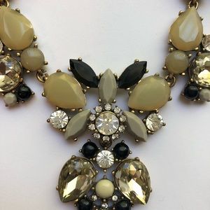 Black, taupe, and Whitestone faux gold necklace